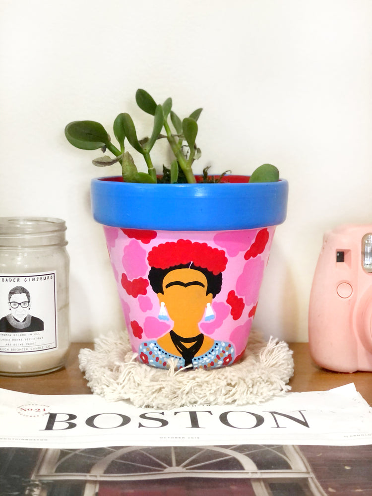 My “Frida" planter is inspired by my girl + fellow artist, Frida Kahlo. It's meant to pair the vibrancy of nature + the boldness of the strong ladies who have paves the way towards female empowerment.