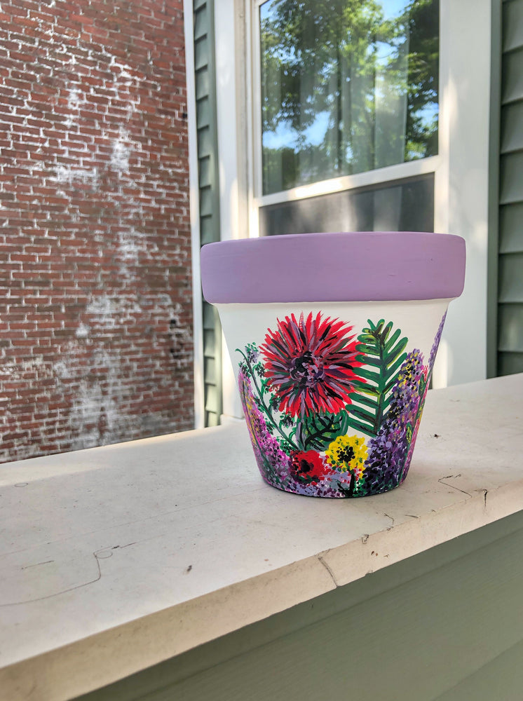 My “Wildflower" hand painted terracotta planter illustrates some of my favorite funky fresh flowers in non-traditional colors.