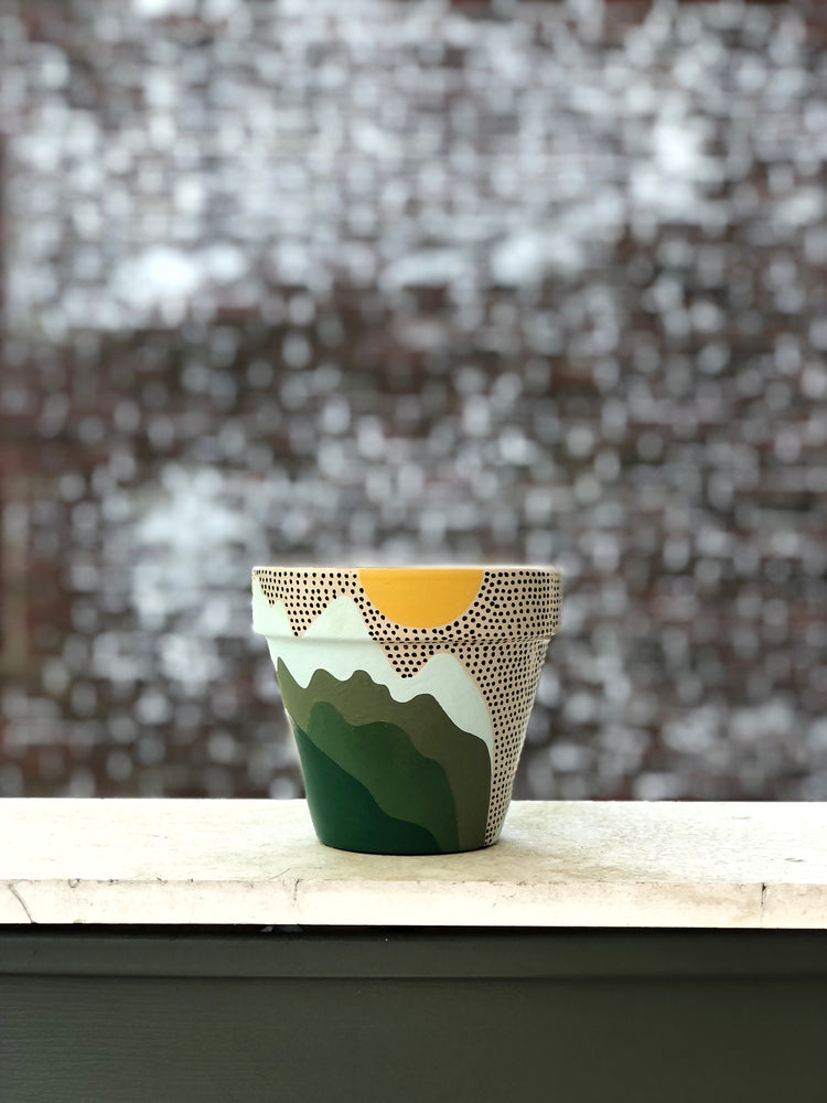 
                
                    Load image into Gallery viewer, Whether you’re planting a tomato plant or a succulent, my terra cotta painted planters will add life &amp;amp; light time your home with their bold &amp;amp; bright colors.   My “Mountain Mama&amp;quot; planter is here to remind you that life is always better in the mountains. Farmland meets pop art.
                
            