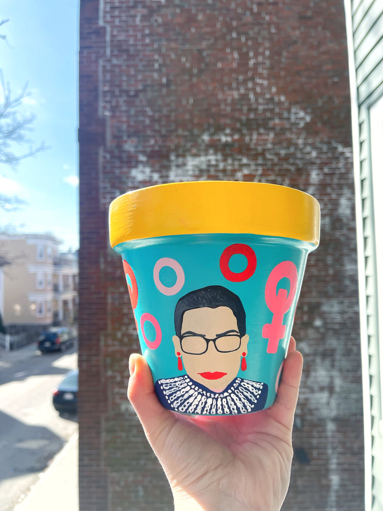 My “RBG" planter is inspired by the queen of the court - Miss Ruth Bader Ginsburg (may this goddess rest in peace). It's meant to pair the courage + the boldness of this strong female lead who has paved the way towards female empowerment.