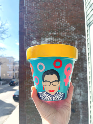 My “RBG" planter is inspired by the queen of the court - Miss Ruth Bader Ginsburg (may this goddess rest in peace). It's meant to pair the courage + the boldness of this strong female lead who has paved the way towards female empowerment.