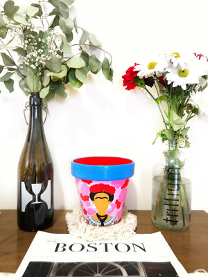 
                
                    Load image into Gallery viewer, My “Frida&amp;quot; planter is inspired by my girl + fellow artist, Frida Kahlo. It&amp;#39;s meant to pair the vibrancy of nature + the boldness of the strong ladies who have paves the way towards female empowerment.
                
            