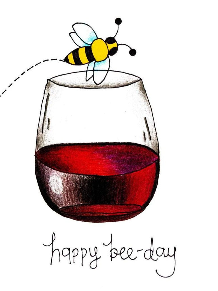 My "Happy Bee-Day” birthday card is a punny handmade + hand-illustrated design meant to bring a smile to your boss babe's face on her birthday! This is a handmade greeting card with an illustration of a glass of wine with a bee on it that says "Happy bee-day. Try not to get too buzzed."