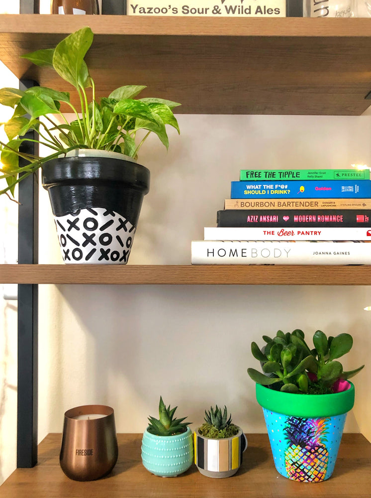 My "X's & O's" hand painted terracotta planter is one of my all time favorites. I love the simplicity of the black and white pattern. This one is for the classy gals who like to keep it neutral!