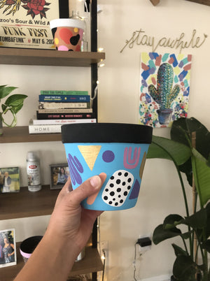 My “90’s Kid" hand painted terracotta planter was inspired by some of my favorite colors and patterns from the 1990’s. Raise your hand if you binge watched Rugrats, ate too many fruit roll ups and wore all the denim!