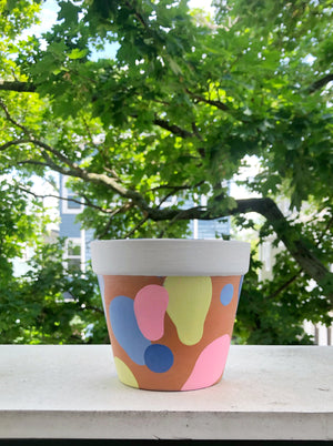 My “Neon Blob" hand painted terracotta planter was inspired by my favorite shade of colors - neon. I love the funkadelic circular shapes. 