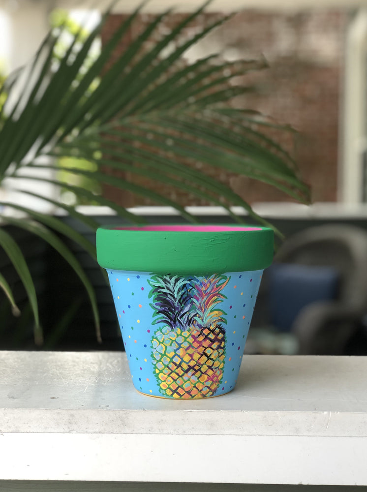 My "Pineapple" hand painted terracotta planter is a symbol of welcome for your home. It's made to bring warmth, friendship and hospitality into your space.