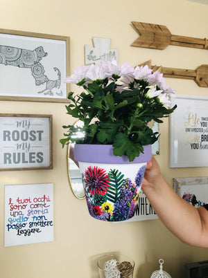 My “Wildflower" hand painted terracotta planter illustrates some of my favorite funky fresh flowers in non-traditional colors.