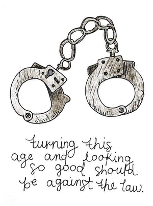 
                
                    Load image into Gallery viewer, My “Birthday - Smooth Criminal” greeting card is a punny handmade + hand-illustrated design meant to bring a smile to your recipient&amp;#39;s face. Handmade 5x7 greeting card with a photo of hand cuffs that says &amp;quot;Turning this age and looking so good should be against the law.&amp;quot;
                
            